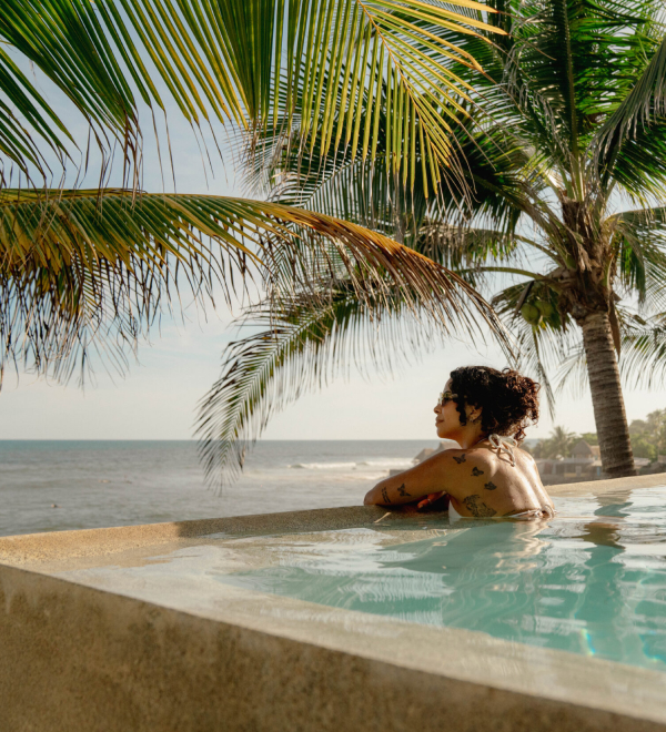 Girl in infinity pool
